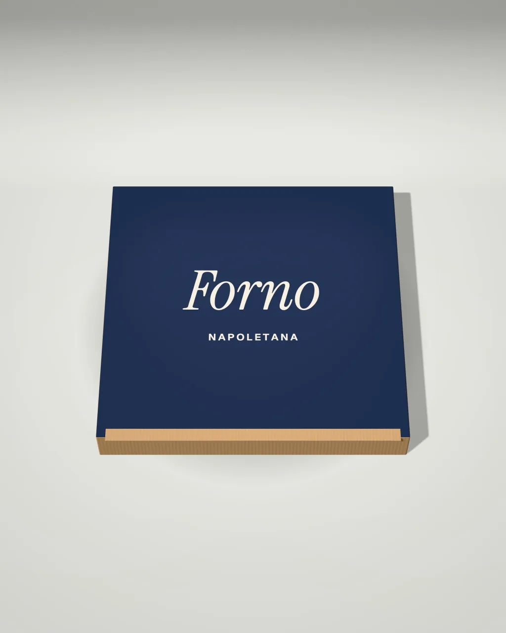 Mockup: Caja de pizza en un estudio claro, desde arriba