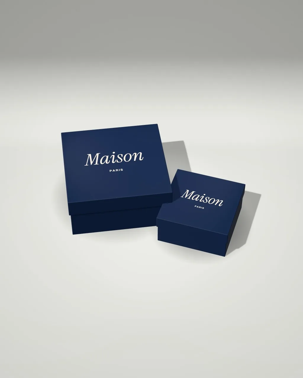 Mockup: Pila de cajas de regalo en un estudio claro