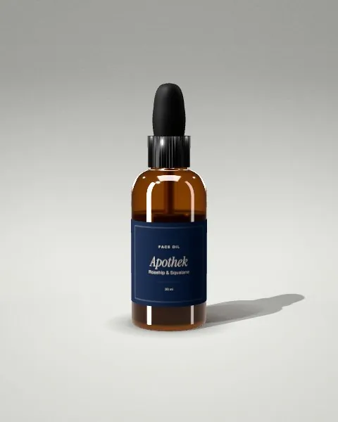 Amber dropper bottle · Light studio · front mockup