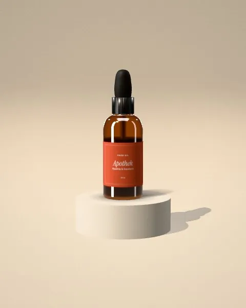 Amber dropper bottle · Sand plinth · front mockup