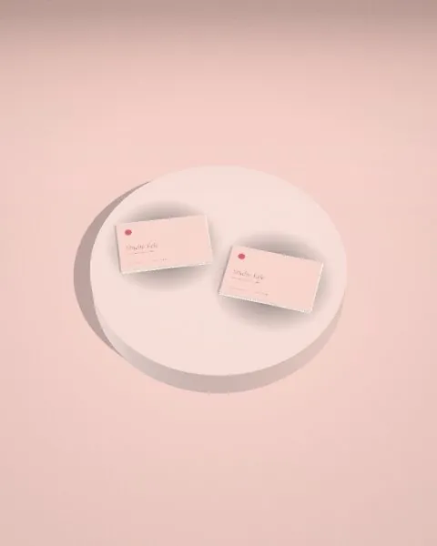 Business card duo · Blush plinth mockup