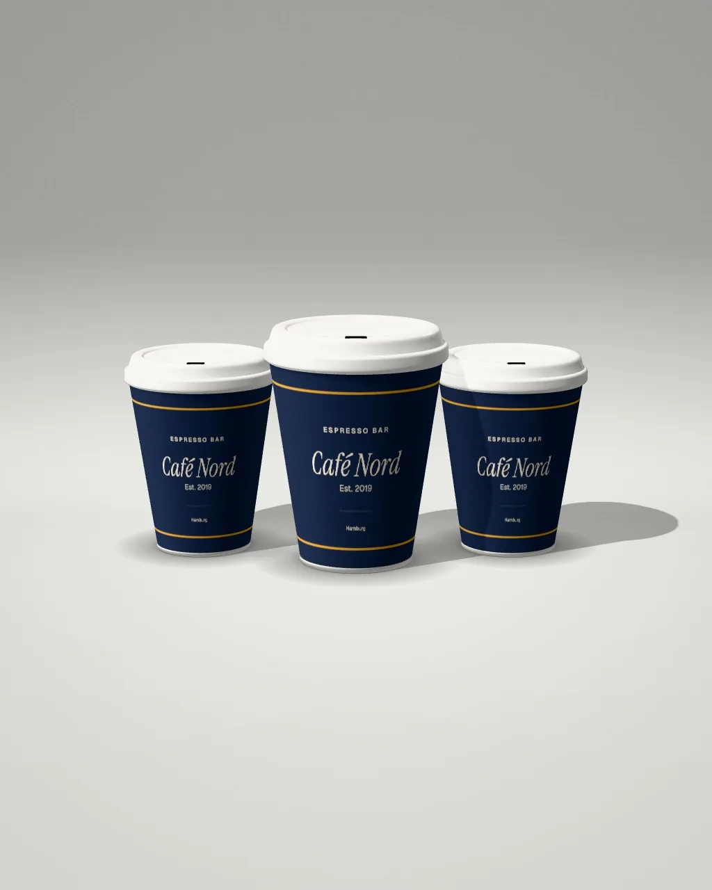Cup trio · Light studio mockup
