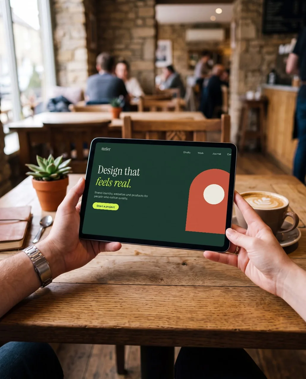 Café: tablet in hands mockup