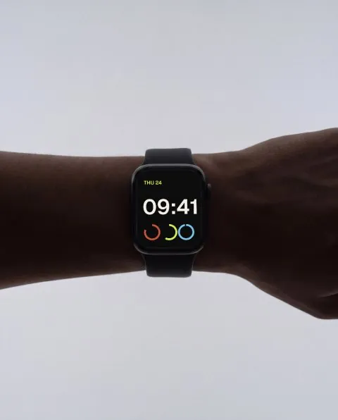 Smartwatch on wrist, grey studio mockup